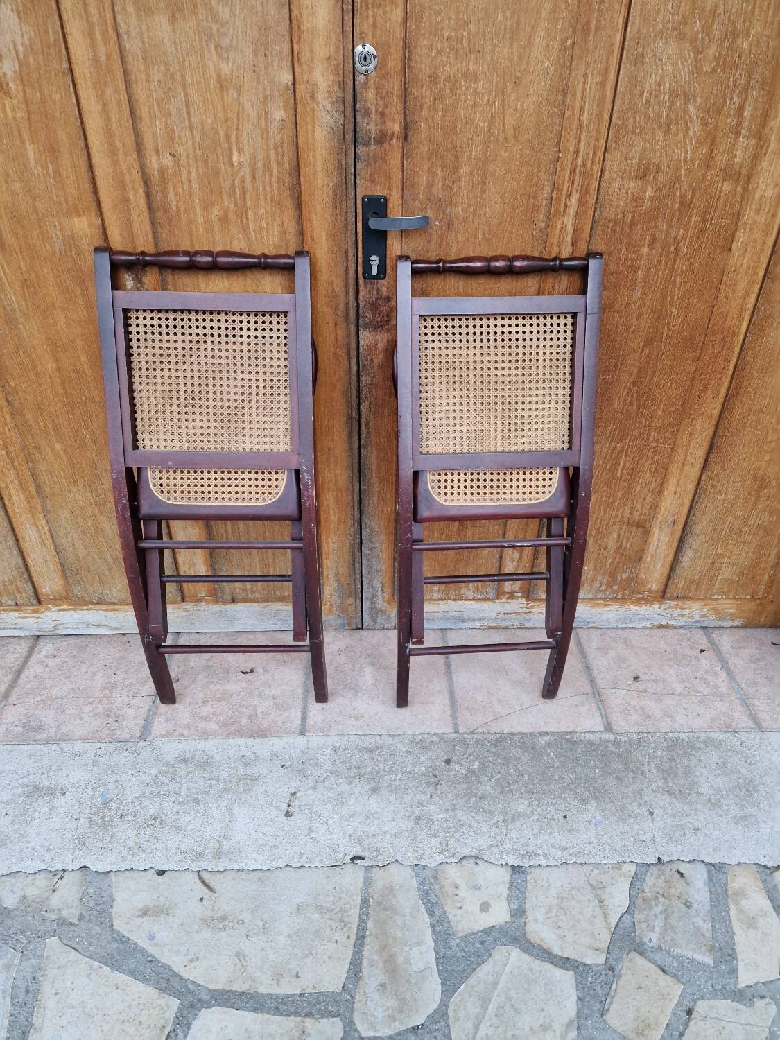 2 vintage caned folding chairs
