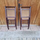 2 vintage caned folding chairs