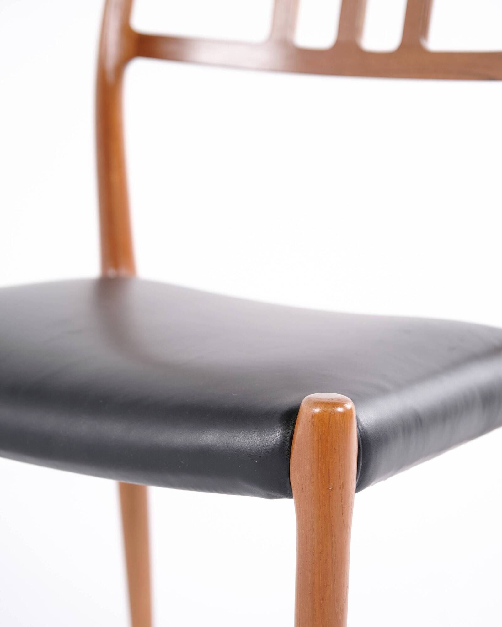 Dining chair – Niels Otto Møller – Model 79 – Teak & black leather – JL Møllers Møbelfabrik – 1960s