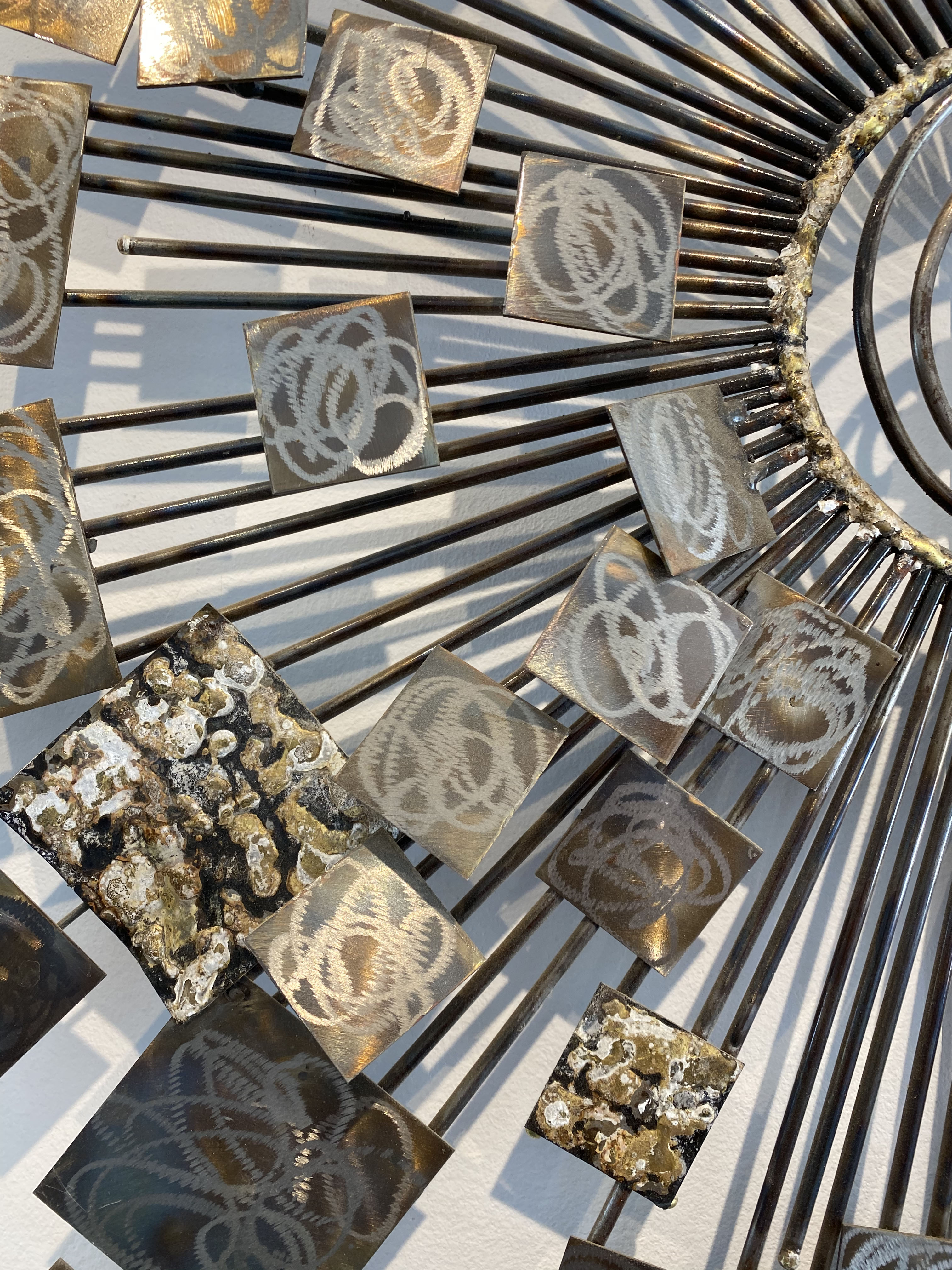 Brutalist Sunburst wall sculpture by Curtis Jere. USA, 2000s