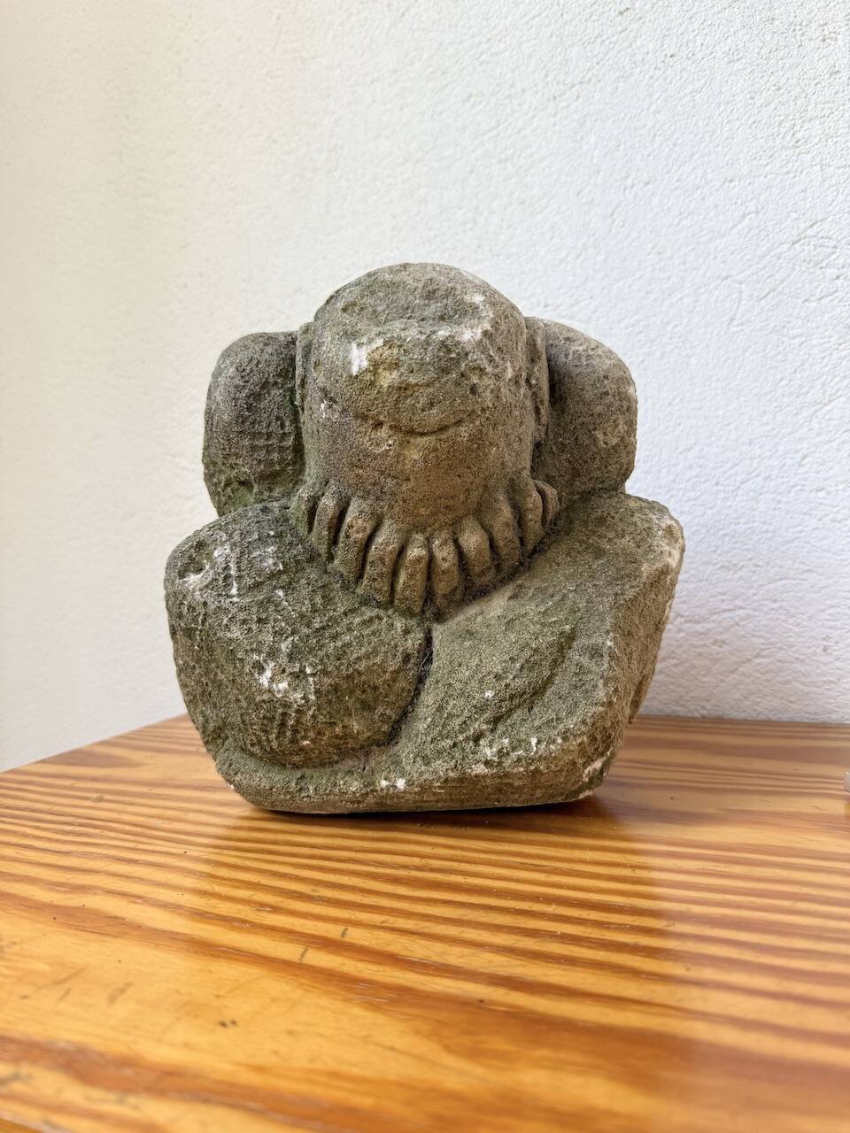 Stone sculpture of a man