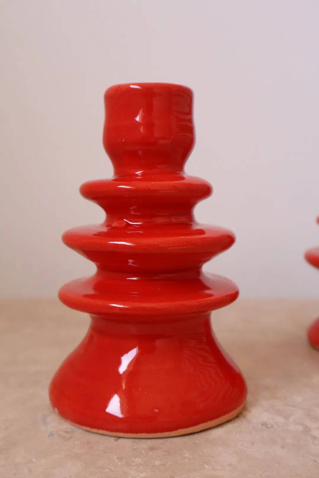 Pair of colorful poppy red ceramic candle holders