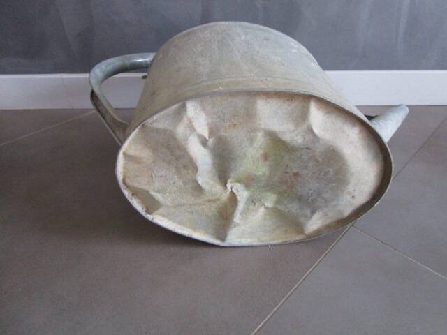 Old zinc watering can