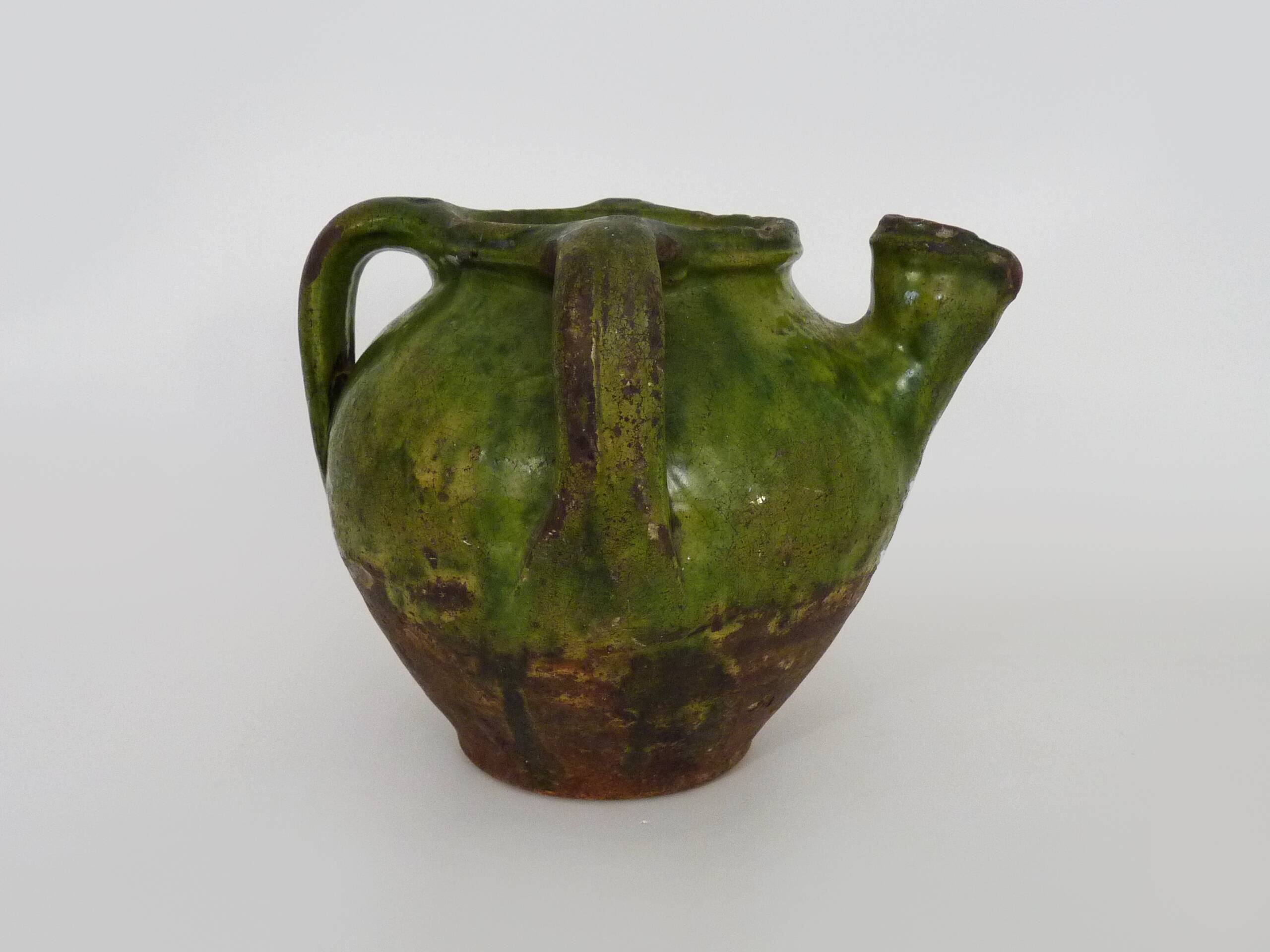 Gargoulette, pottery water pitcher in glazed green terracotta, Haute Pyrénées. 18th century
