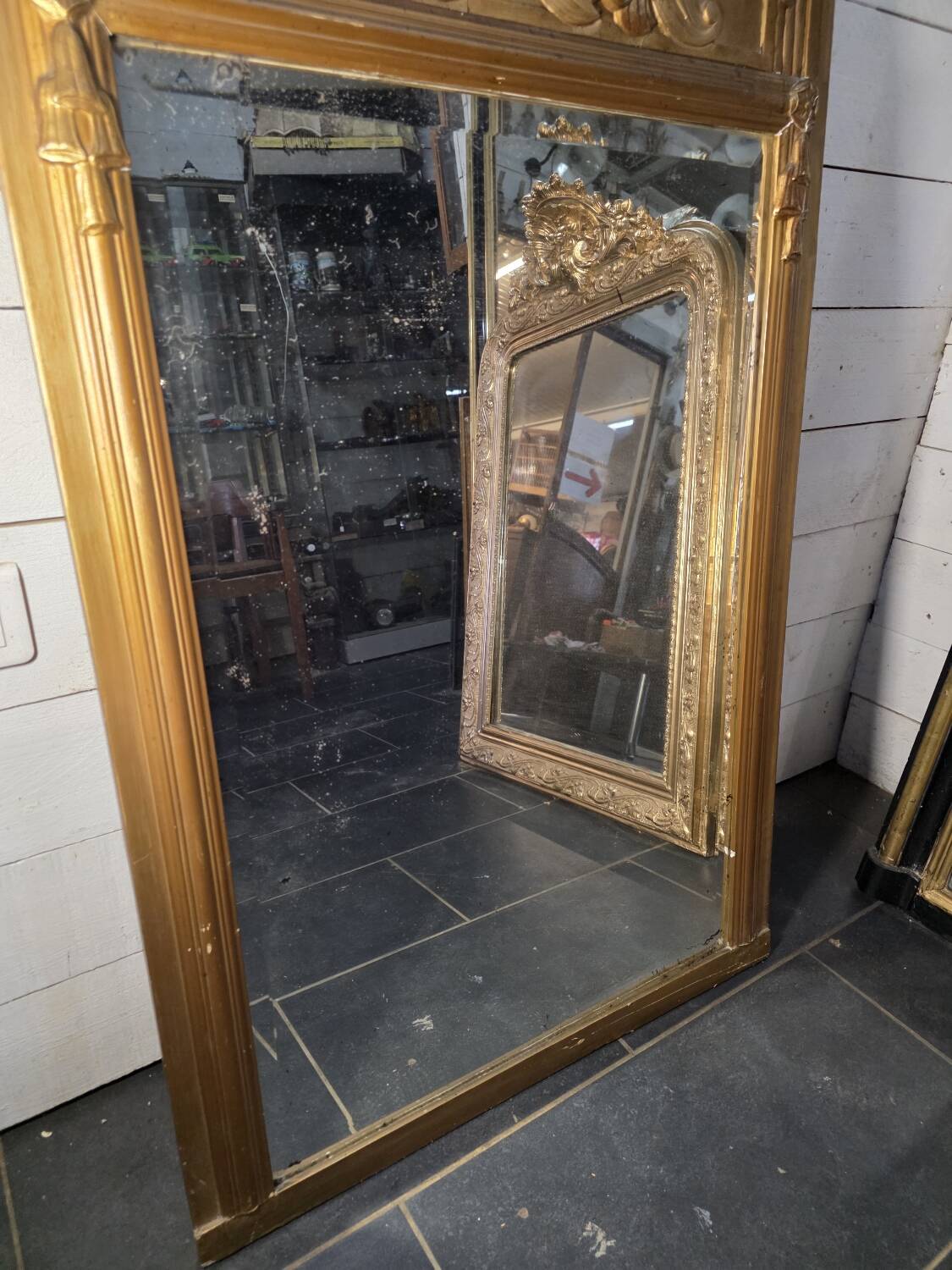 Art Deco gilded trumeau, bevelled mirror