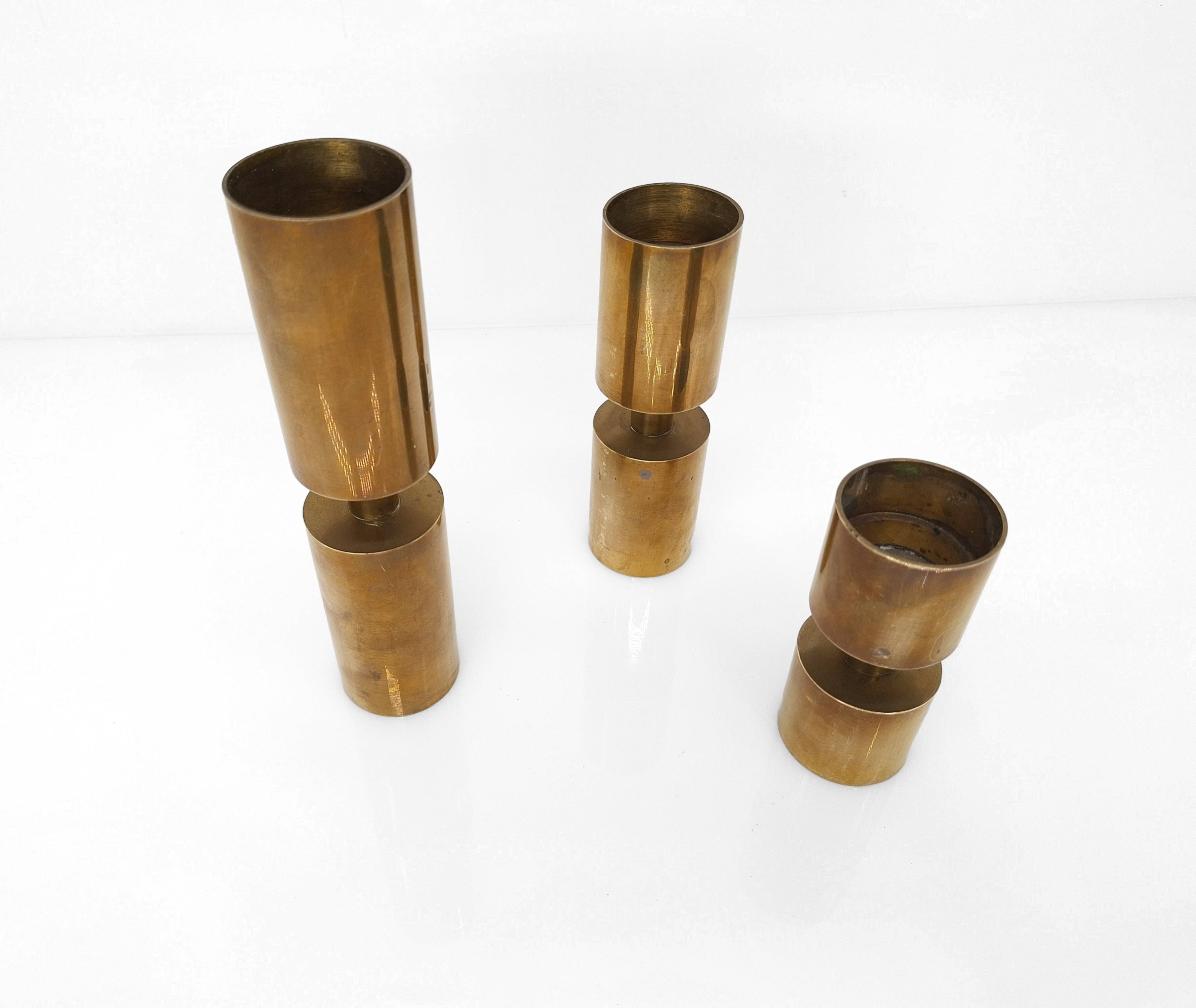 3 Scandinavian candlesticks in solid brass Thelma Zoega, Sweden, 1976