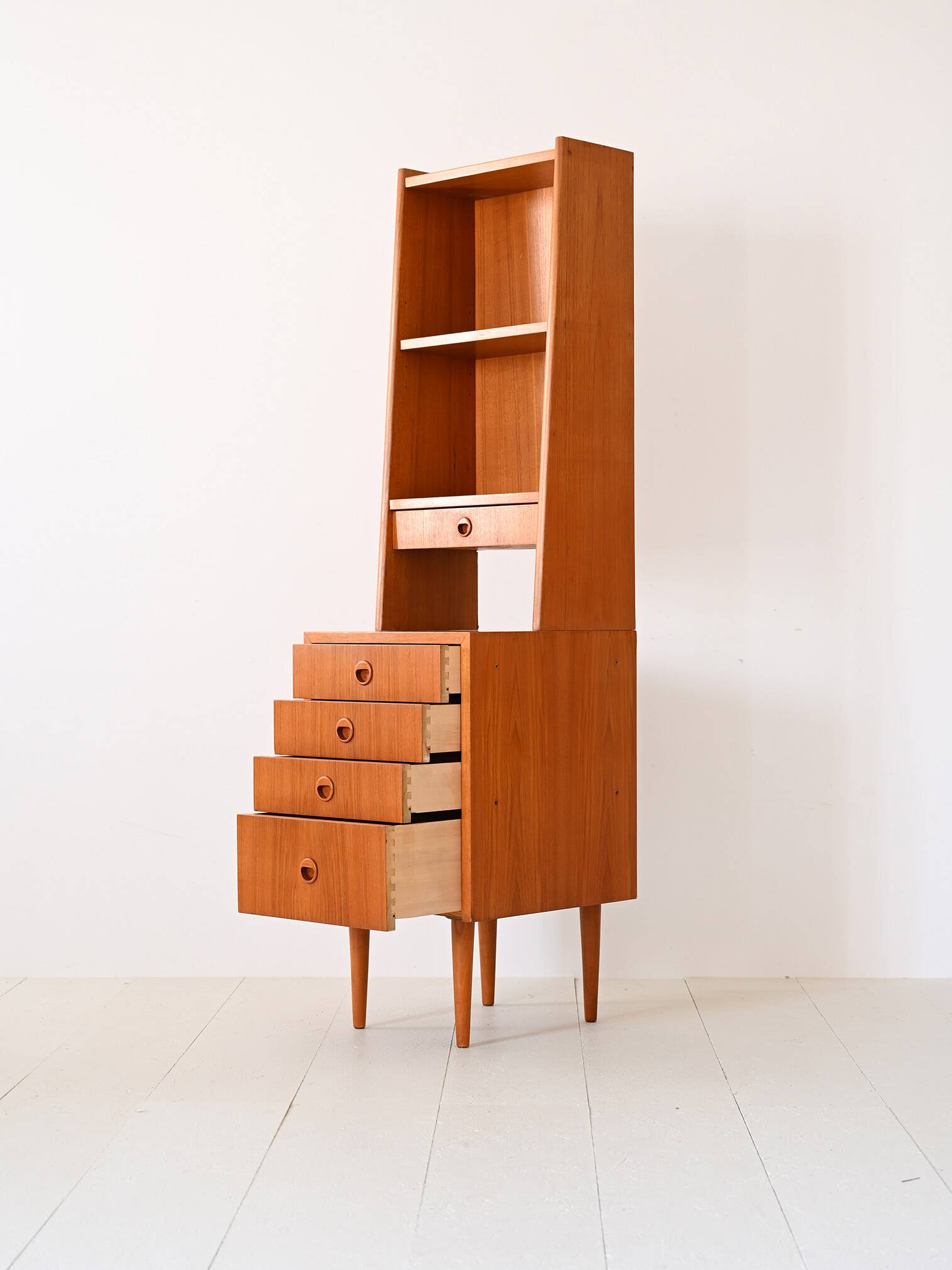 Fine teak bookcase with drawers