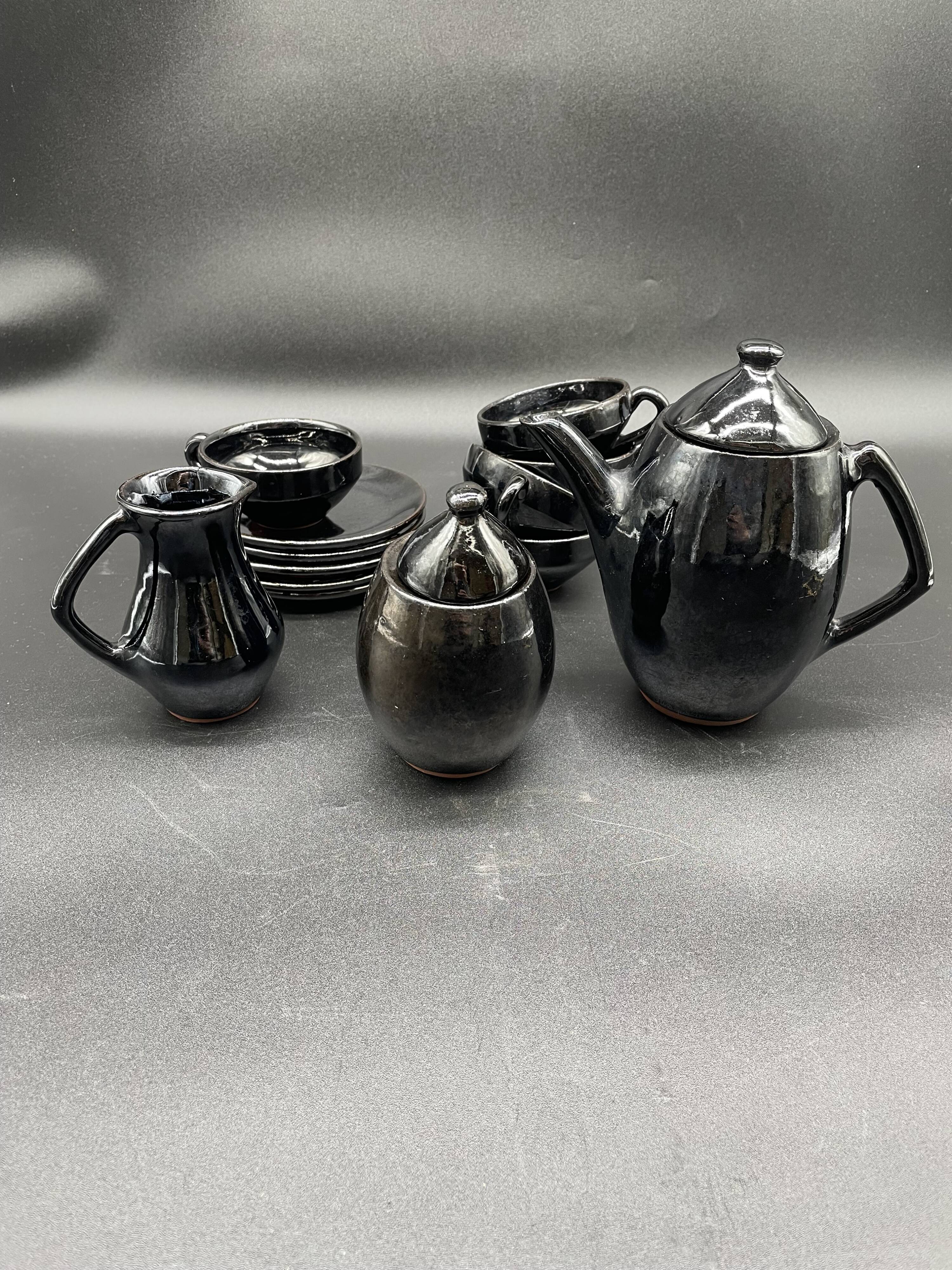 Brutalist black ceramic coffee service – Modernist design