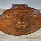 Coffee table in walnut with maple inlays and wheels