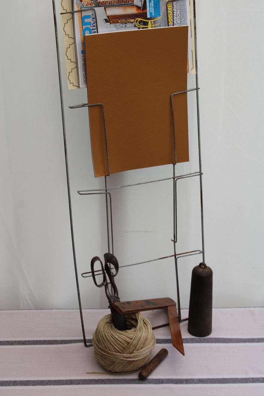 Former metal newspaper display