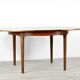 Midcentury extending round teak table and chairs by Nathan