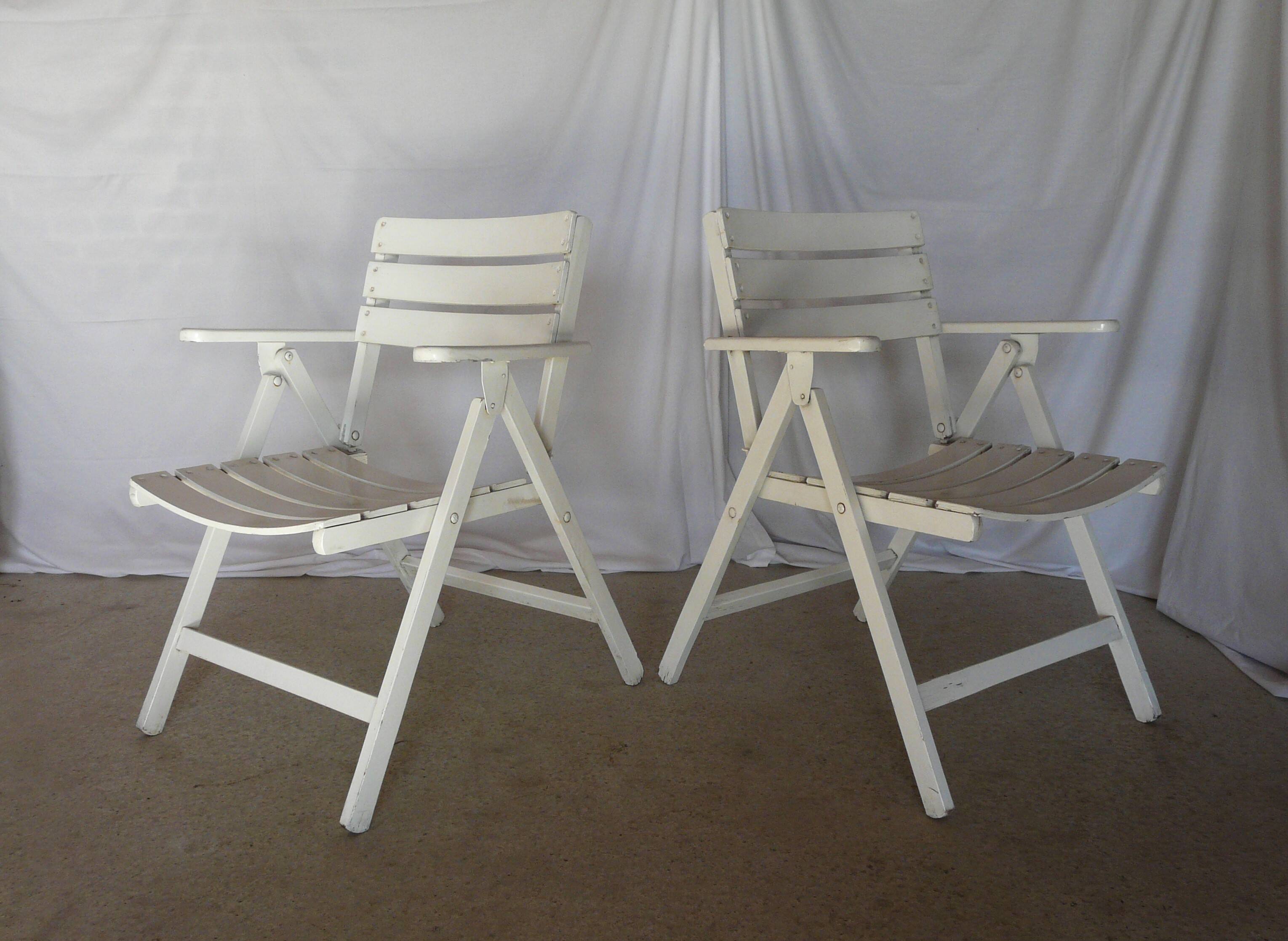 Four vintage wooden garden armchairs from the 1950s