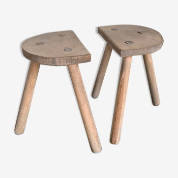 Duo of tripod stools in raw wood