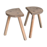 Duo of tripod stools in raw wood
