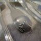 11 silver-plated dessert spoons by Christofle Vendome, 17cm