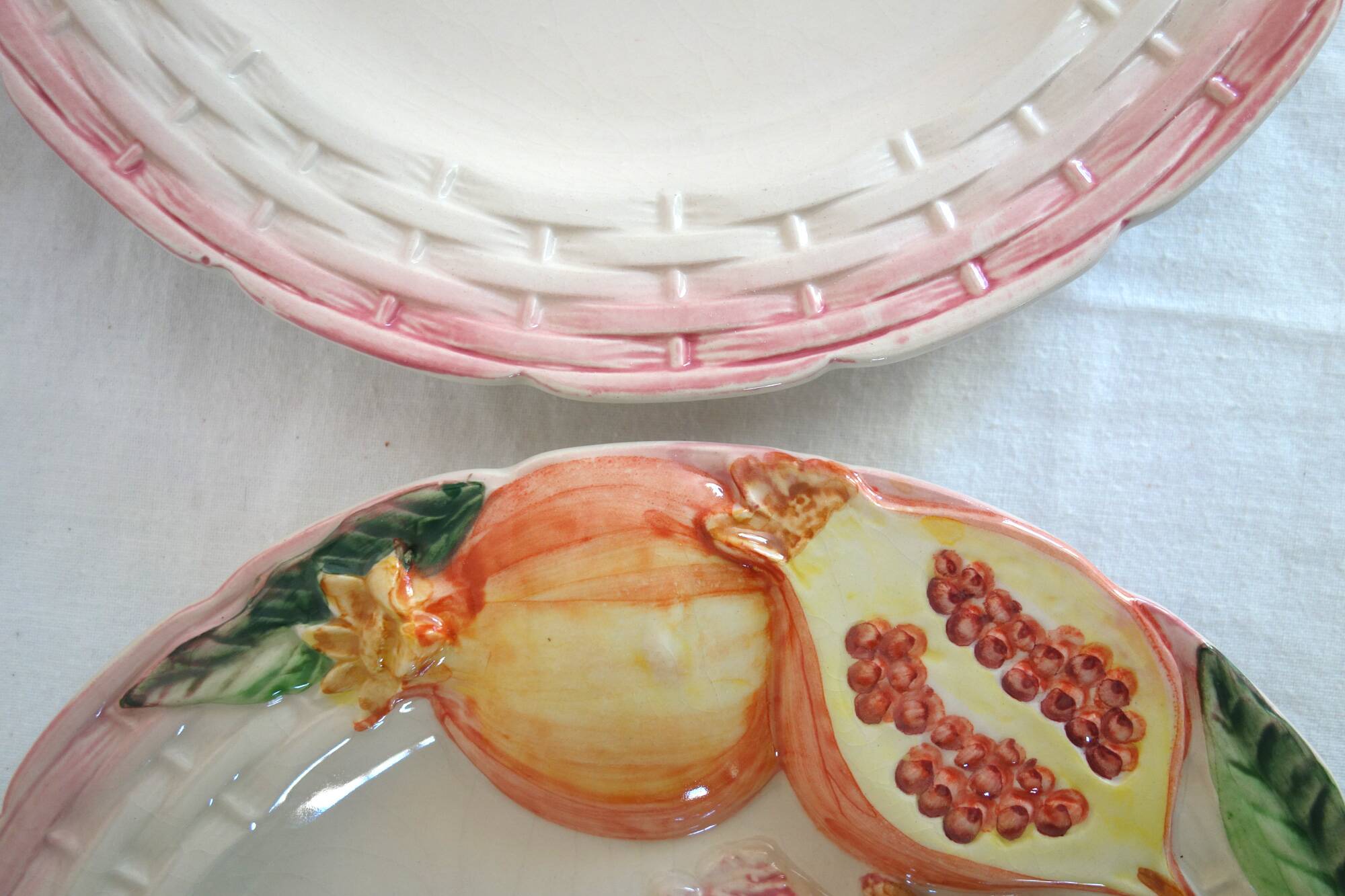2 vintage pomegranate slip plates signed Francesco Guarino
