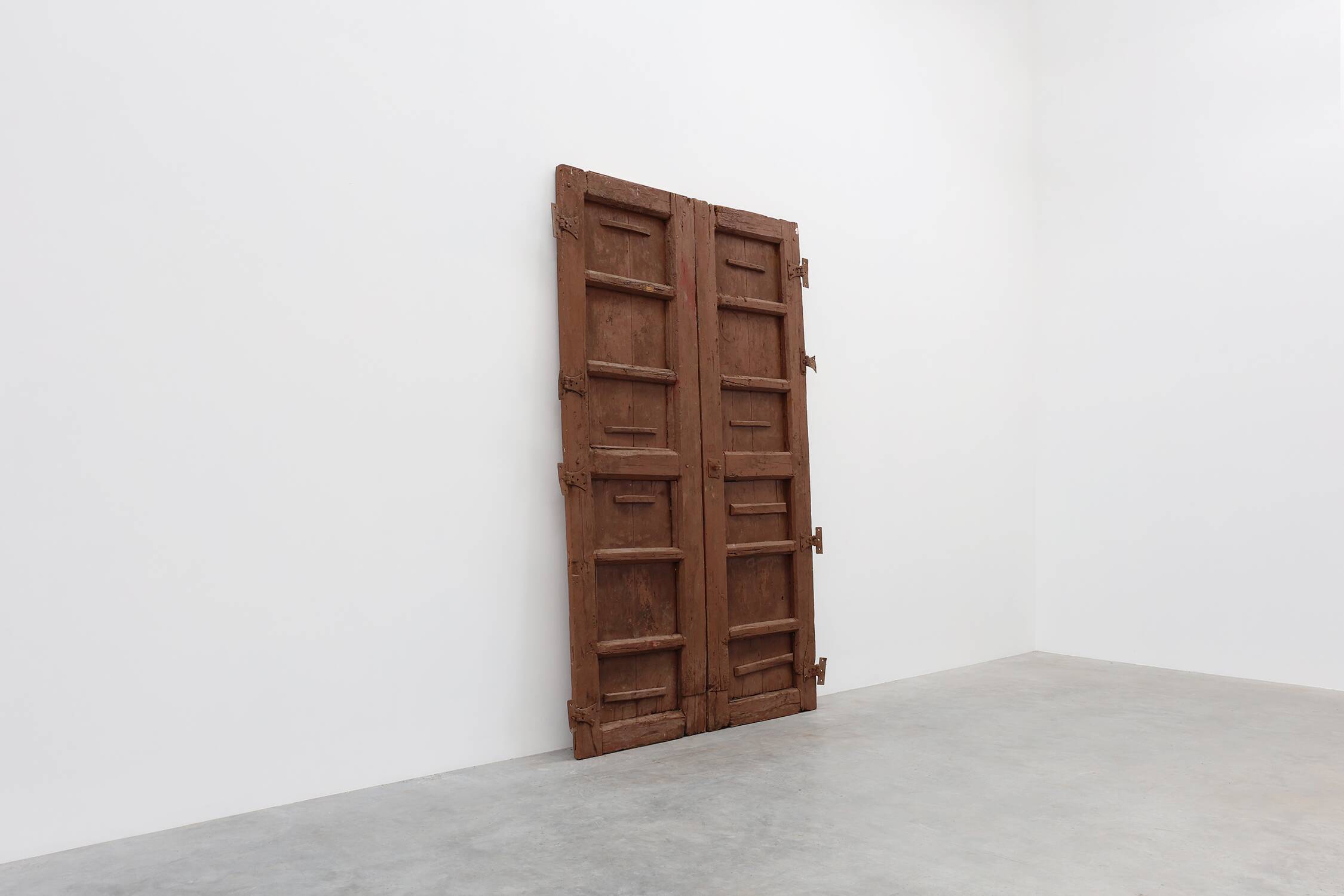 Large 17th century Monastery doors in terracotta lacquered oak, Portugal
