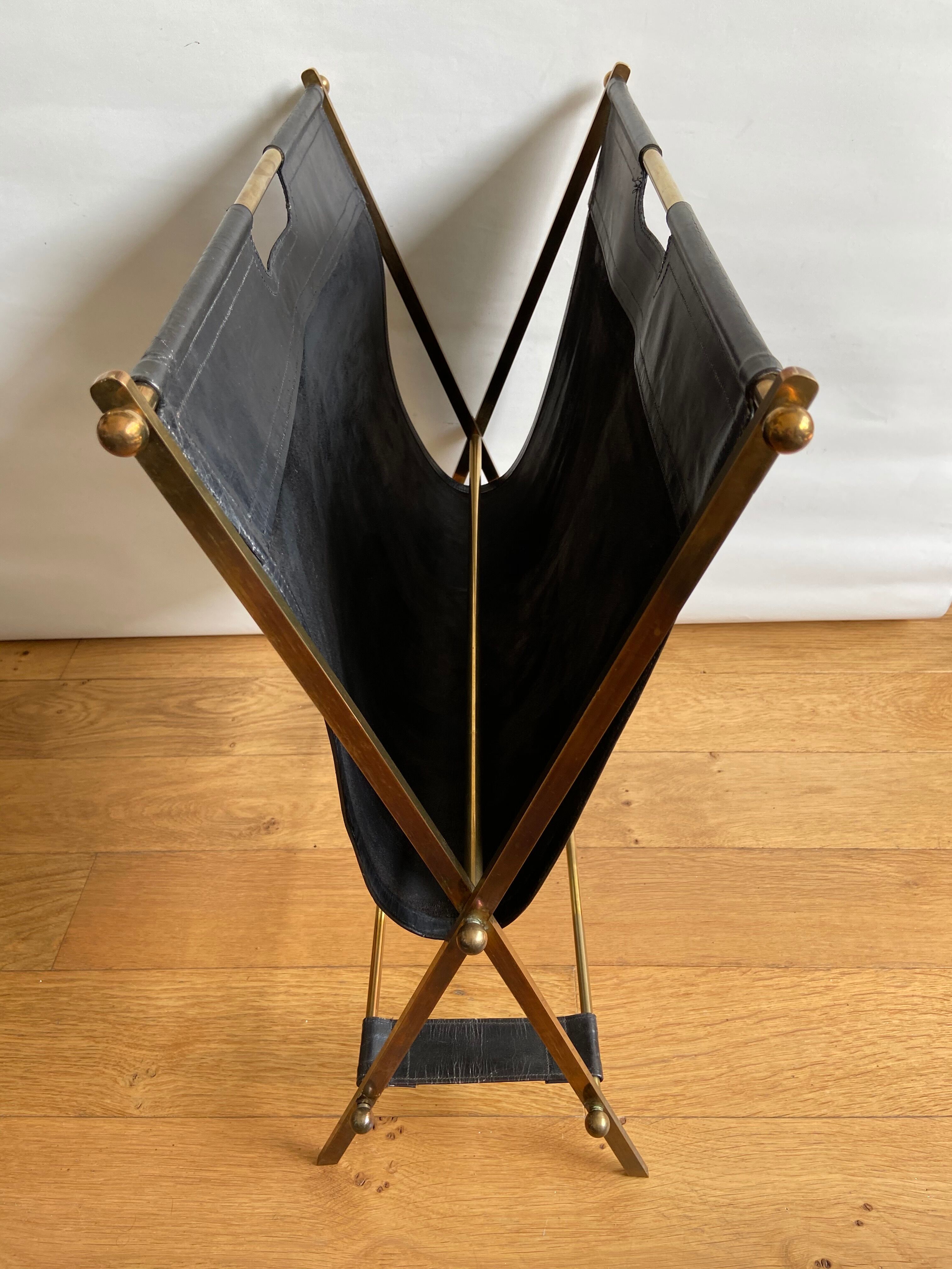 Leather and gilded brass magazine holder