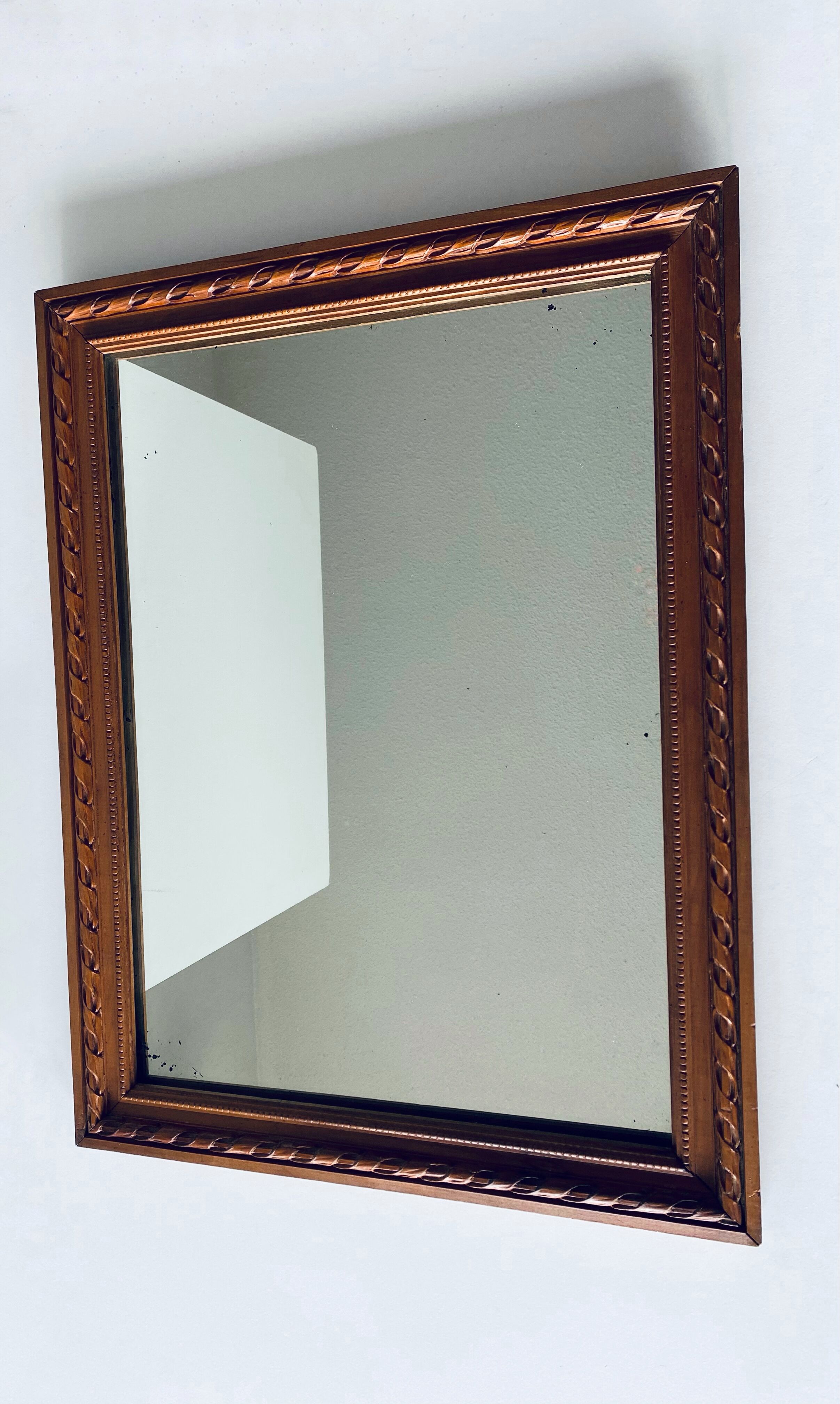 Antique mirror in carved wood and mercury 48x63cm