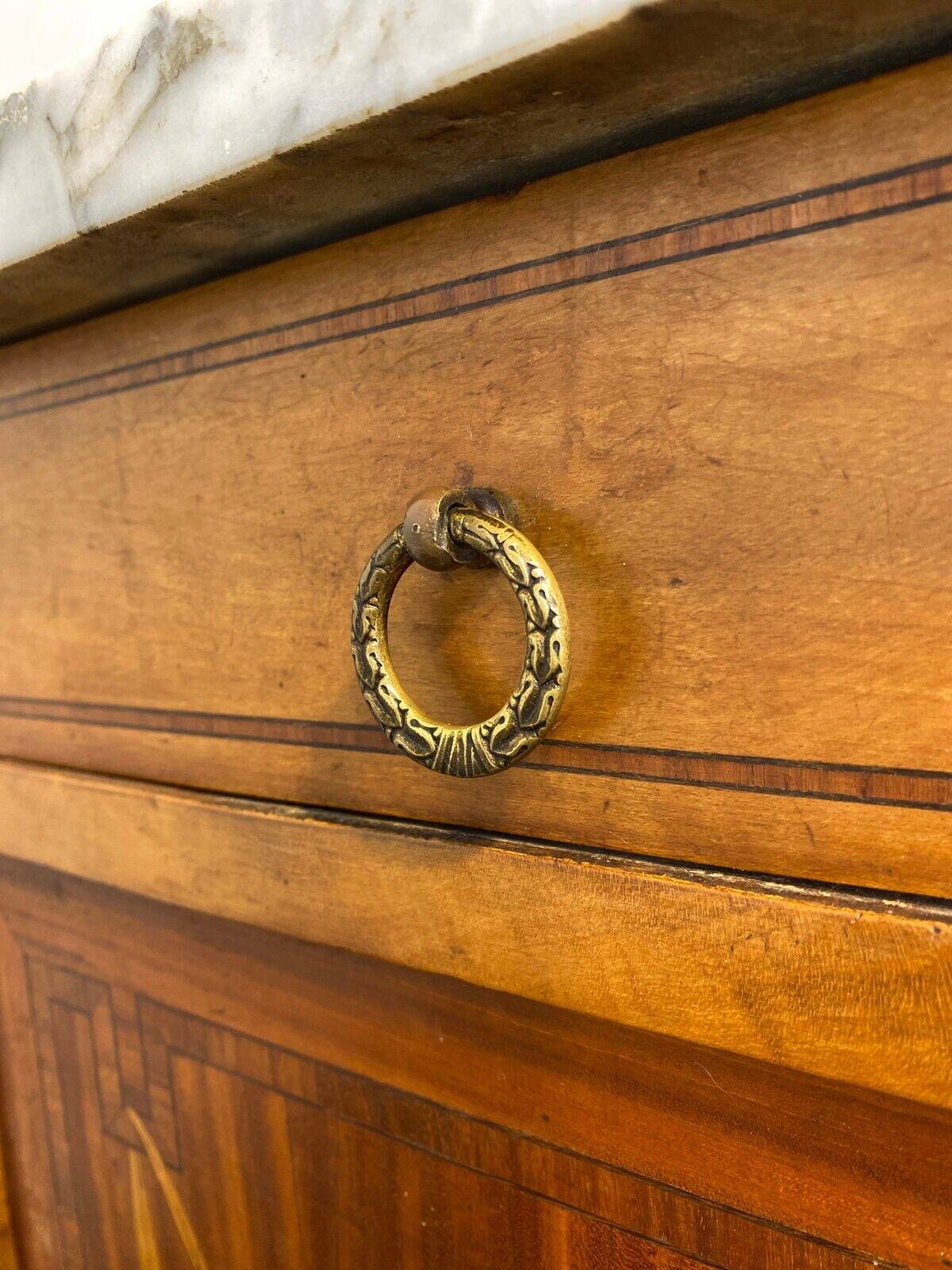 Louis XVI style bedside table, with a marble top and marquetry.