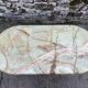 Oval coffee table in onyx and gilded brass in the Louis XVI style.
