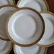 Lot of 8 small porcelain bread plates.