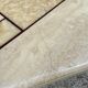 Low table in travertine and onyx 80'