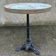 Round bistro table, cast iron legs, vintage, 1940s