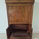 Mahogany secretary desk with marble top and interior mirror.