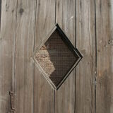 Porte ancienne provenant d'un four a pain