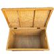Large vintage wicker chest with green decoration.