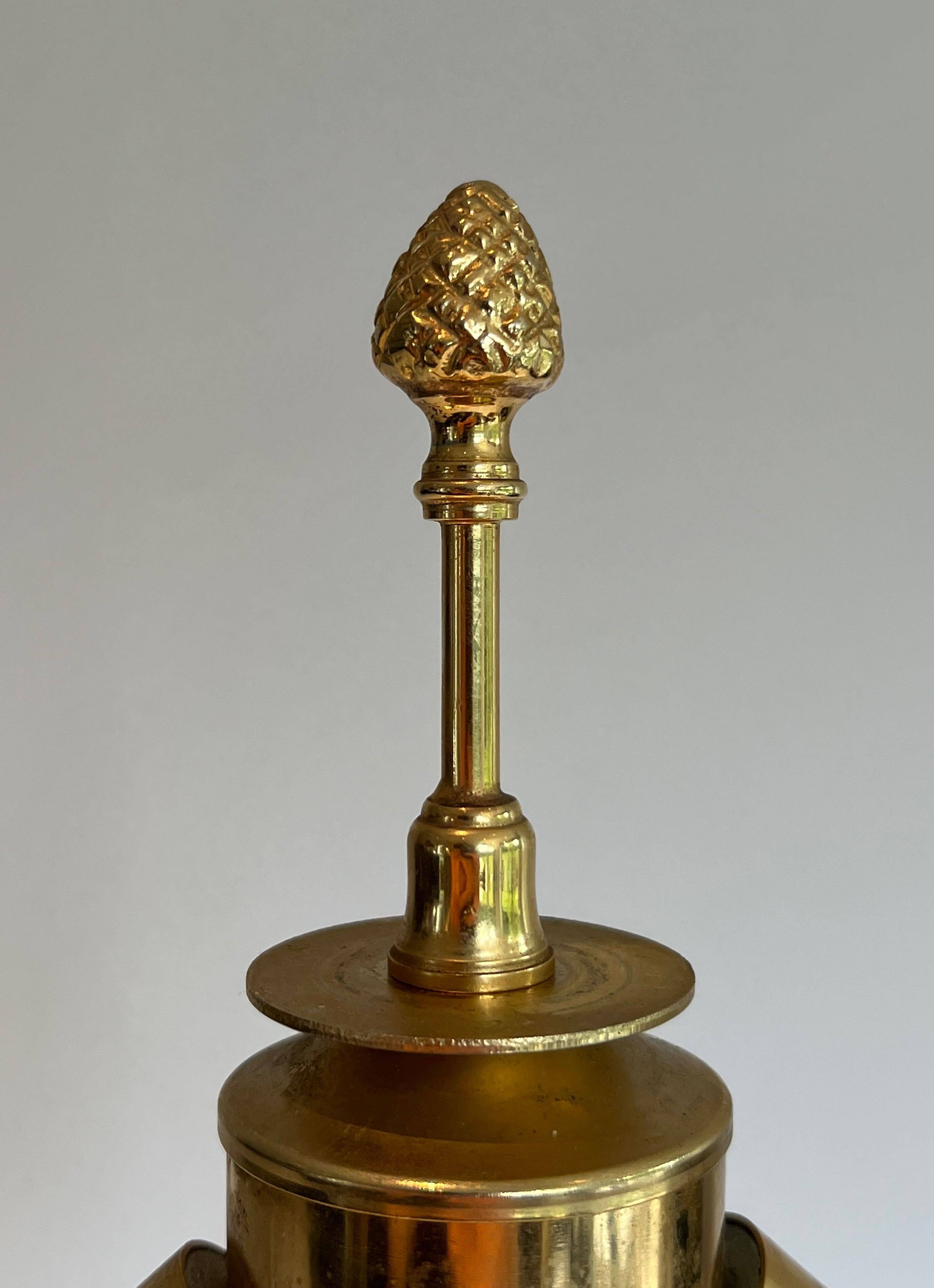 Pair of palm lamps in chrome and brass in the style of Maison Charles. Circa 1970.
