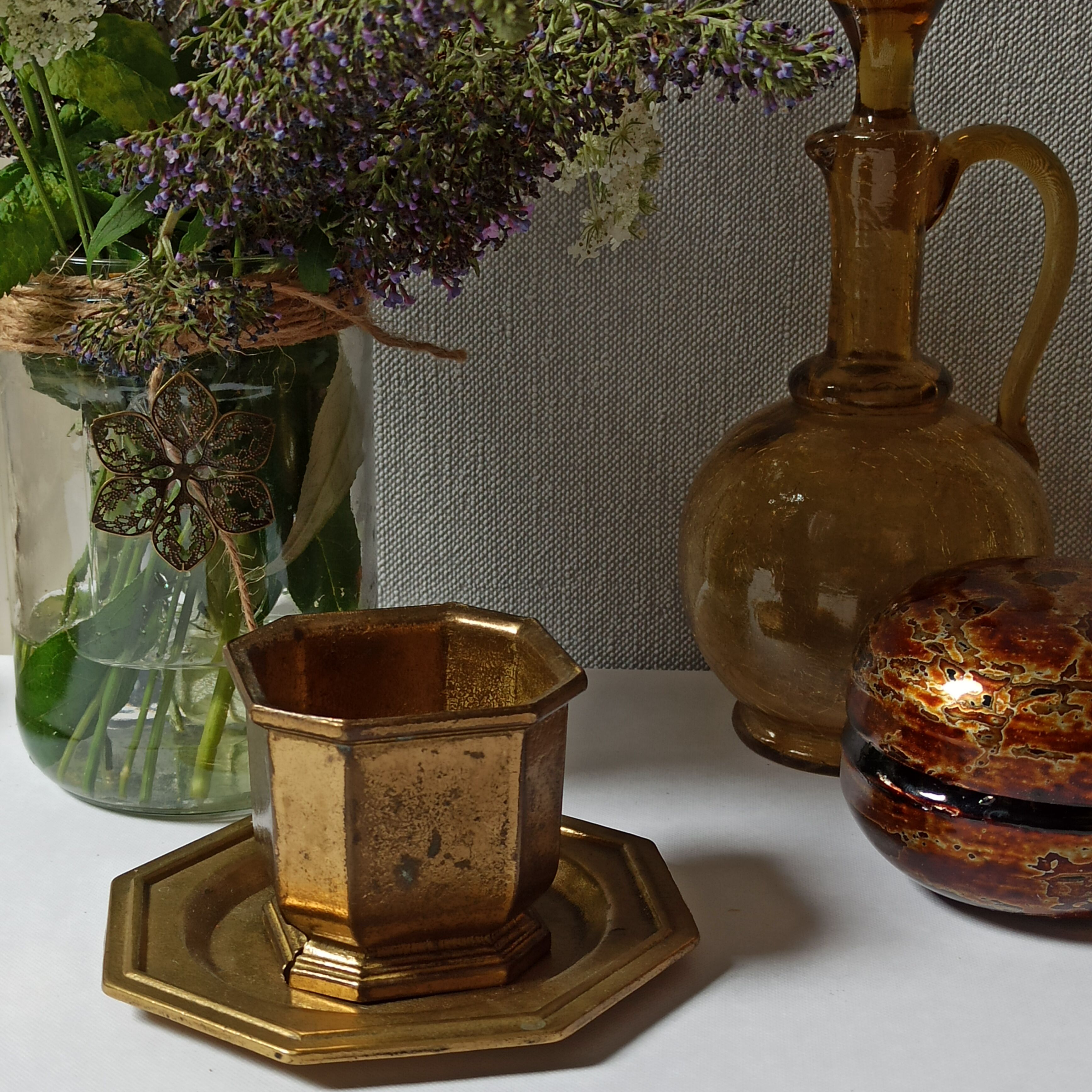Varnished brass pot on saucer from the 80s