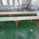 Pairs of large benches in raw fir wood.