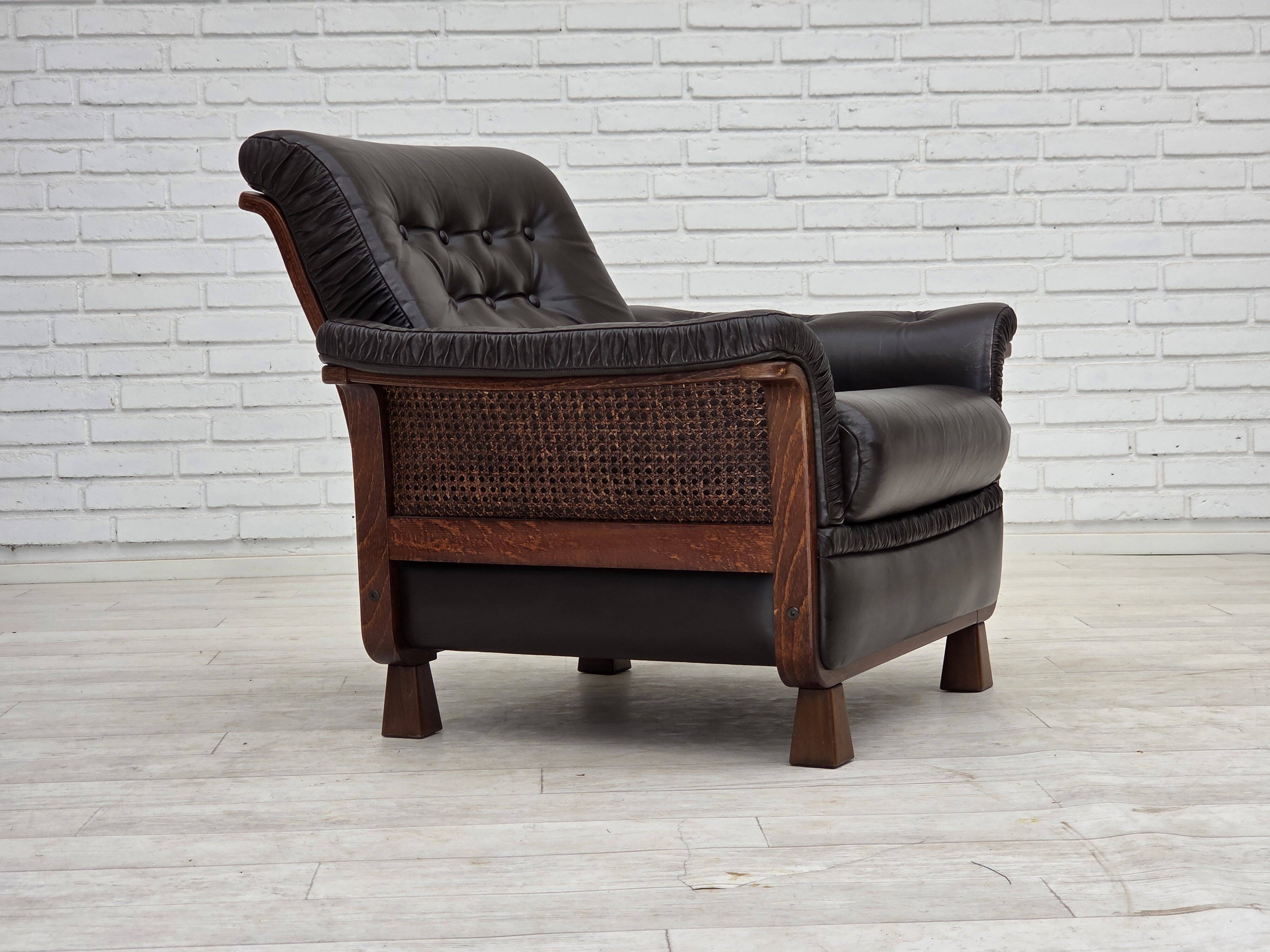 1970s, Scandinavian armchair, brown furniture leather, teak wood legs.