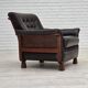 Fauteuil scandinave années 1970, cuir d'ameublement marron, pieds en bois de teck.