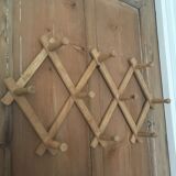 Ten hook coat rack scalable in wood