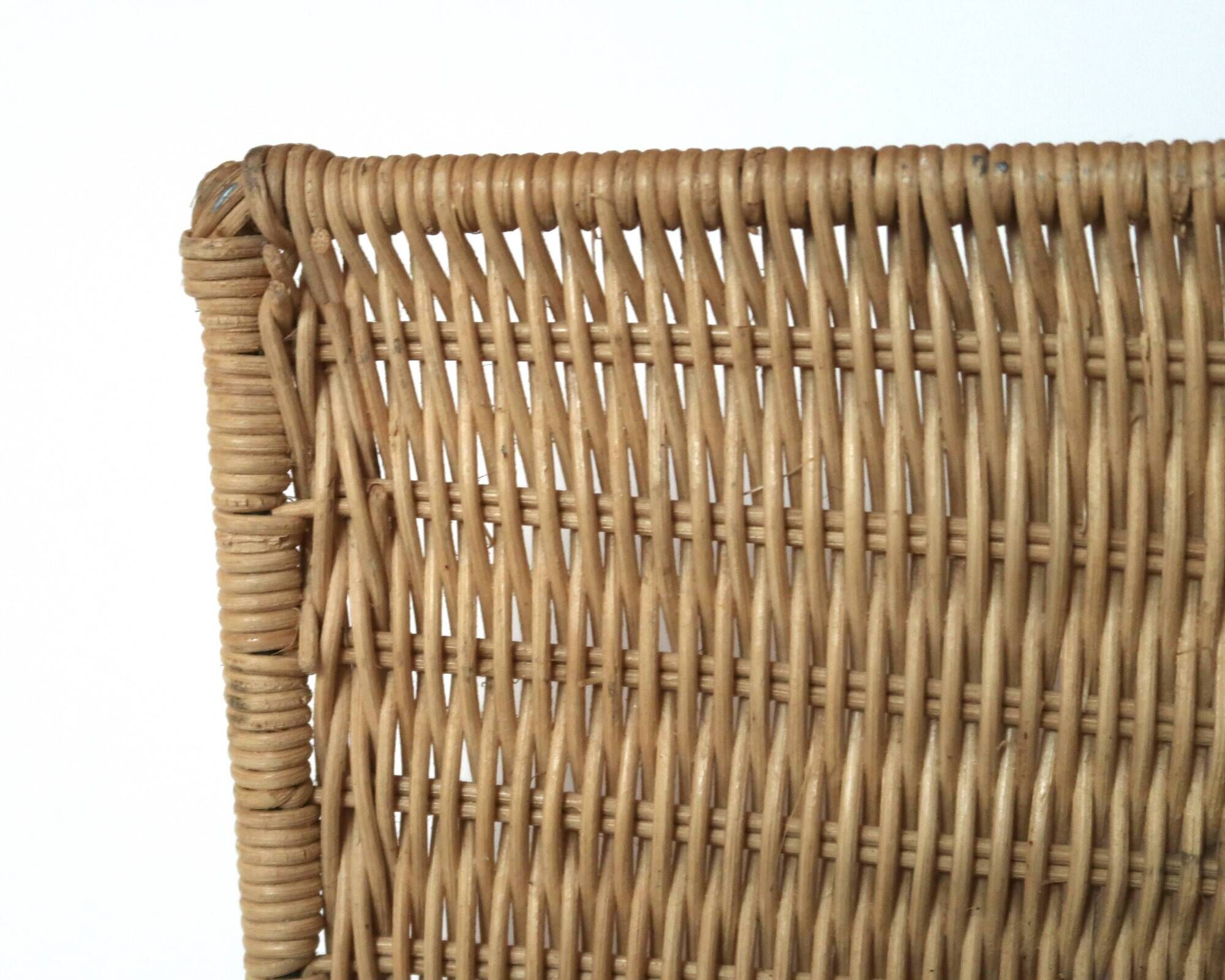 Wall-mounted magazine rack TIBY in rattan wicker by Karl Malmvall for Ikea from the 90s.