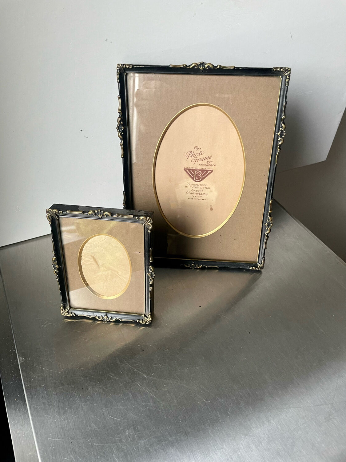 Pair of English Antique Metal Picture Frames in 2 different sizes