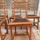 Set of 6 antique turned wooden chairs with embossed leather seats.