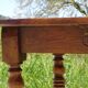 Antique walnut console table with honey spoon legs.