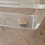 Plexiglas and gold metal rolling table