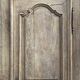 Eighteenth-century Parisian armoire with one bonnetière door in raw wood.