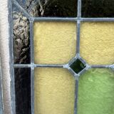 Pair of stained glass windows with geometric patterns late nineteenth century