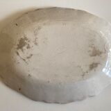 19th-day polished earth dish with godrons