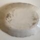 19th-day polished earth dish with godrons