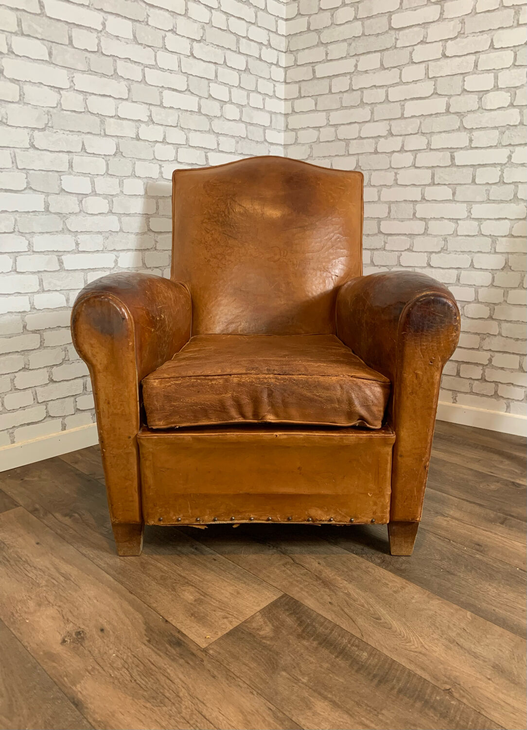 Club armchair in leather 1930