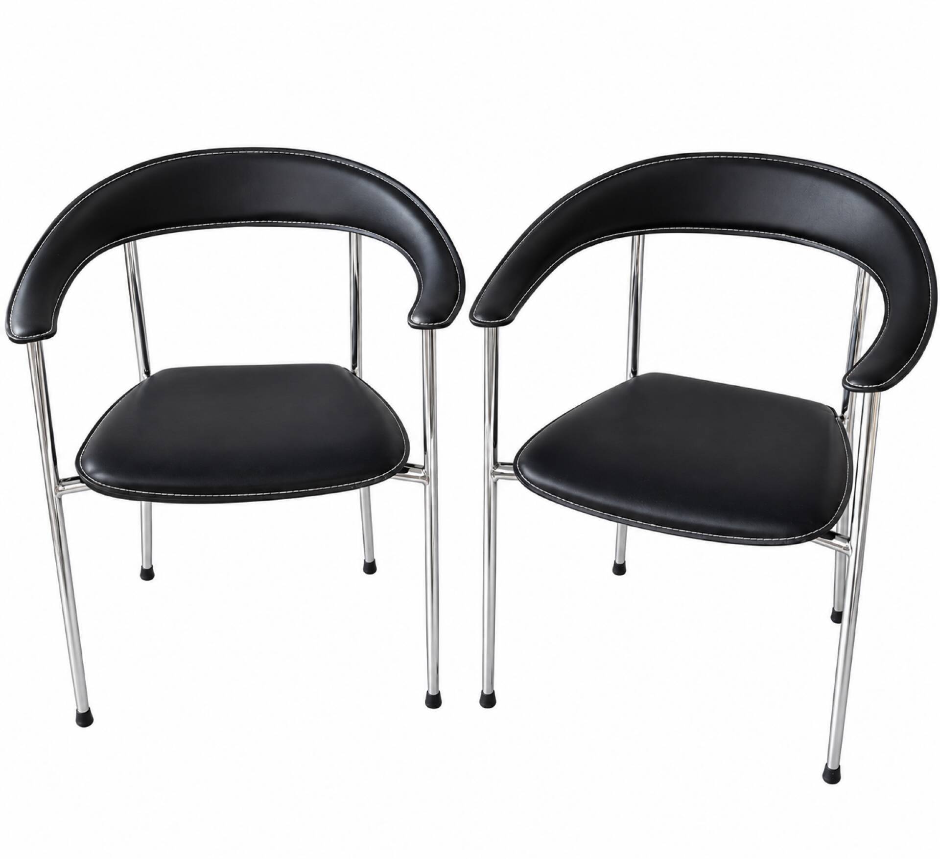 Set of two metal chairs with a brushed finish and black leather.
