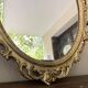 Oval mirror in Baroque style