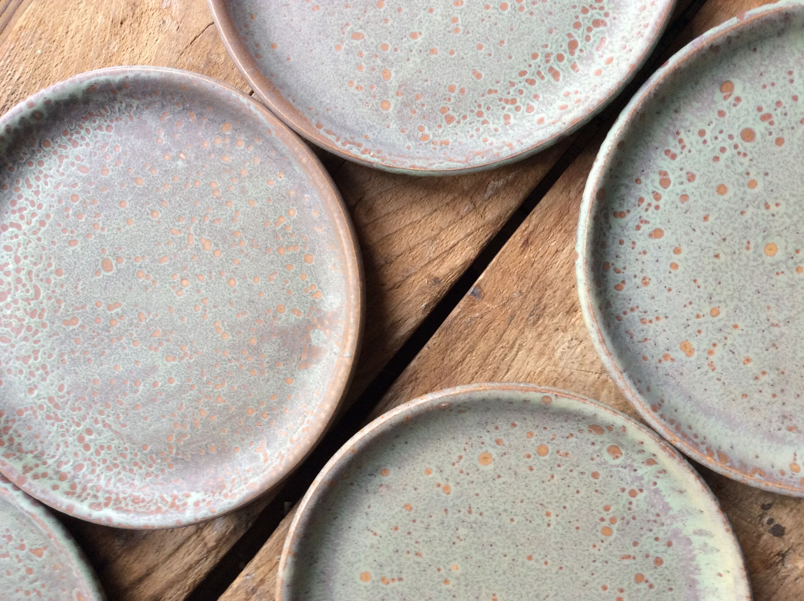 Set of 12 large and 11 small sandstone plates